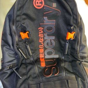 Great condition Superdry backpack orange and black